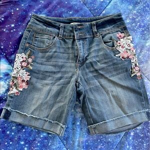 Floral embroidered jean shorts